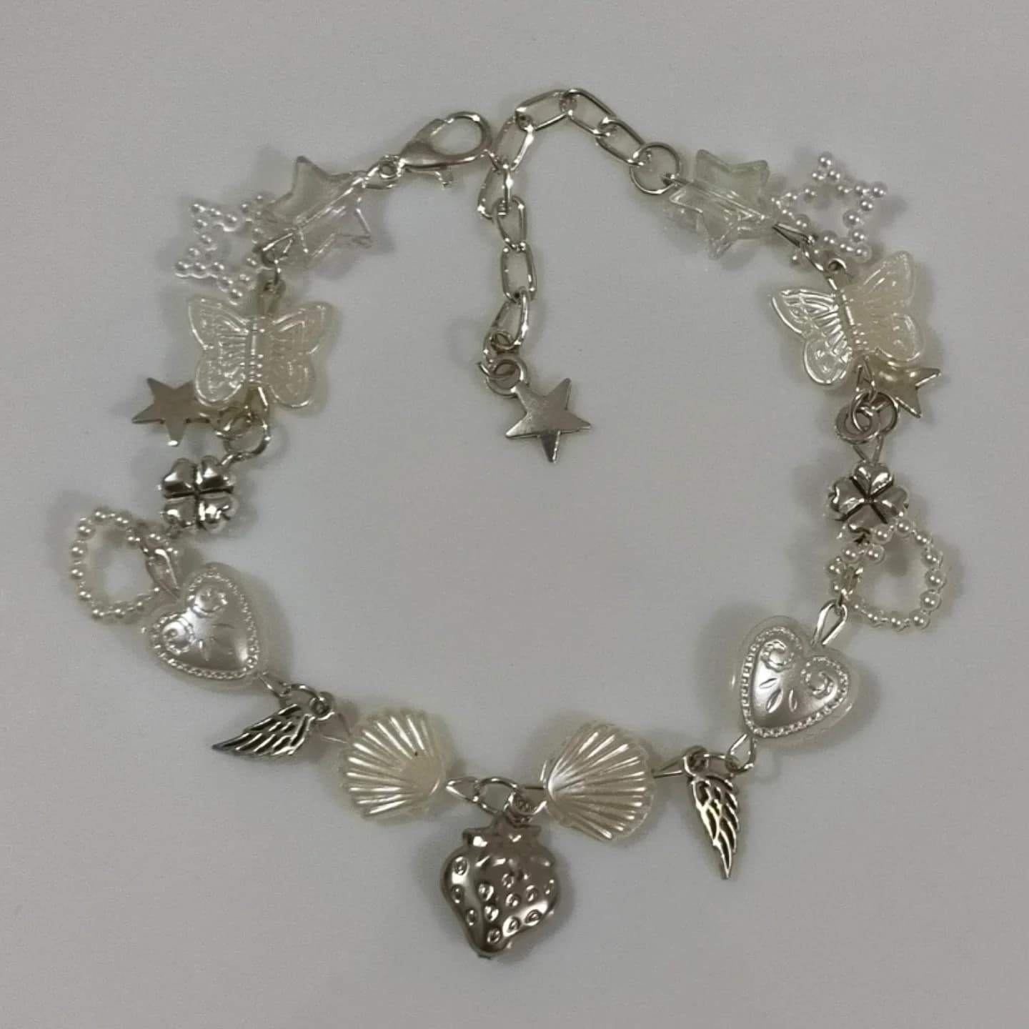 Silver Charm Bracelet – Butterfly, Heart, Star, Wing & Strawberry Charms