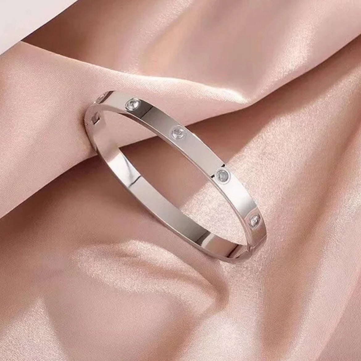 Elegant Silver-Tone Bangle with Crystal Accents Bracelet