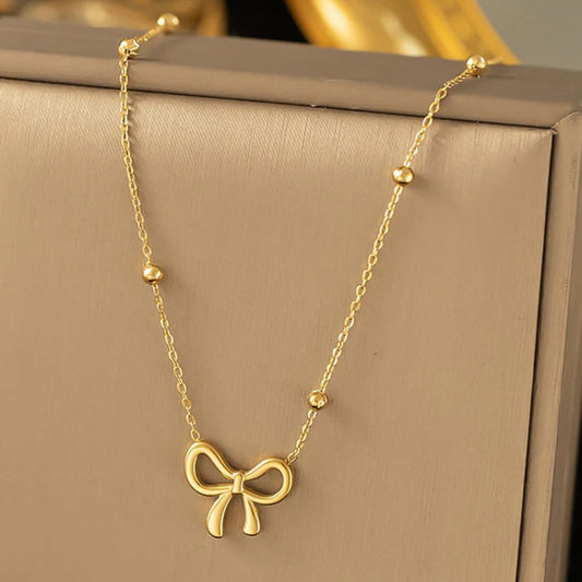 Delicate Gold Bow Pendant Necklace
